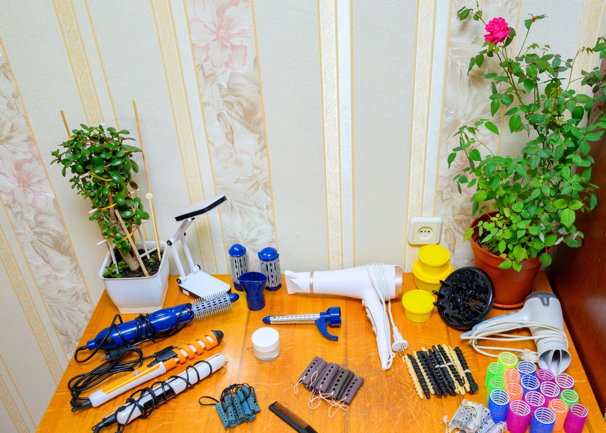 Beauty and styling tools arranged on a table
